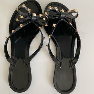Valentino black bow flip flops with gold studs